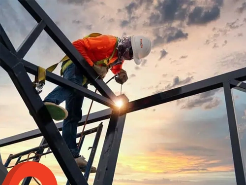 Welder working with sparks flying